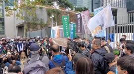 Health workers protest outside government offices in Hong Kong over deadly coronavirus