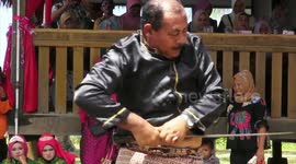 Showmen in Indonesia show off gruesome 'weapon immunity' skills