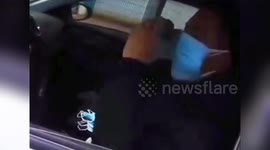 Chinese motorist wears over ten face masks to prevent contraction of novel coronavirus