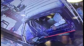 Police tow truck crashes into jewellery shop on streets of Indian city