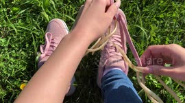 Long natural nails and shoelaces