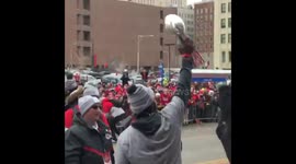 Lombardi luge! Super Bowl champ Travis Kelce chugs beer sliding down trophy at Kansas City championship parade