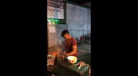 The Vietnamese street chef used his head to catch the noodles flying in the air