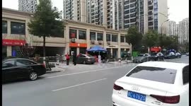 Volunteers arguing with drivers to take their temperature