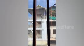 Neighbour from hell drops rubbish bags from 4th floor