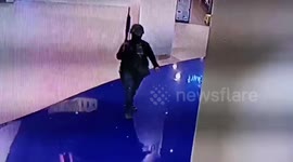 Chilling CCTV shows Thailand gunman walking through shopping mall