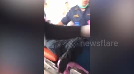 Paramedics perform CPR on Thai gunman who killed at least 26 in mass shooting