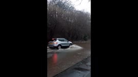 River bursts banks in Rossendale flooding roads as Storm Ciara batters UK