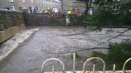 Lancashire residents battle to save homes from flooding after River Irwell bursts banks