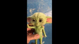 Baby Yoda figure from mandolorian tv series
