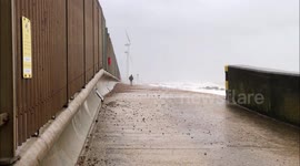 Storm Ciara Man on Beach Pathway hit by a Large Wave