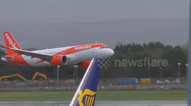EasyJet Airbus A320 NEO Go-Around at Manchester Airport, Just Feet Above the Runway in Stormy Conditions