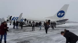 Plane en route from Moscow crash-lands at northern Russia's Usinsk in blustery conditions