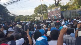 Thousands of Salvadorans gather to demand the country's congress to approve $109m loan to better equip police force