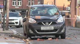 Falling bricks and tiles caused by storm Ciara destroy car