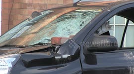 Falling bricks and tiles destroy car during Storm Ciara