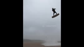 UK adrenaline junkie kite surfs in 80mph winds during Storm Ciara