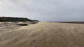 Dramatic sandstorm on Old Hunstanton beach caused by Storm Ciara's powerful winds
