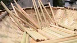 This young man is making reusable bamboo straws in Indonesia