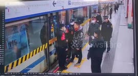 Chinese man attacks police officers who stop him from boarding train without wearing mask during coronavirus outbreak