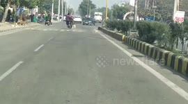 Indian police officer dragged 500 metres along road by rogue youths on motorbike