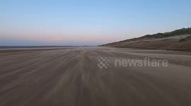 High winds and tides batter the coast