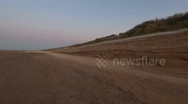 High winds and tides batter the coast