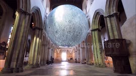 Otherworldly floating replica of the moon arrives at Rochester Cathedral, UK