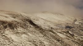 Aerial view of snow covered mountain in Northern Ireland