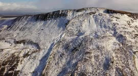Stunning Snow Covered Mountain - Aerial View