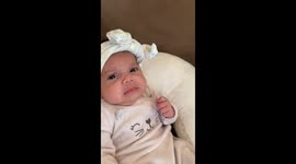 Baby girl watches herself cry and doesn't know what emotion to feel