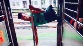 Death-defying train stunt performed by double amputee in Mumbai
