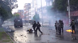 Colombian riot police clash with student protesters in Bogota