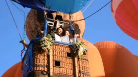 Couples get married in hot air balloons for Valentine's Day in Thailand