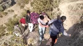 Indian villagers make 10km mountain trek carrying sick man to hospital due to stalled road building