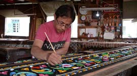 Witness this artist craft colourful wooden carvings in western Indonesia