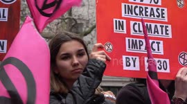 Extinction Rebellion protesters block roads around London Fashion Week venue