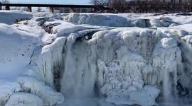 South Dakota waterfall partially freezes in extreme cold