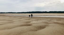 Family walk at the Beach