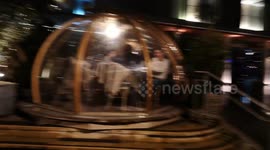 People Eating In Food Domes At A Restaurant Brave Storm Dennis