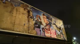 Storm Dennis Batters And Advertising Sign In East London