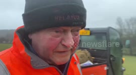Derbyshire farmer feeds sheep during Storm Dennis