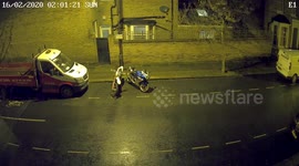 Newsflare Edit - Storm Dennis - brick wall collapsing on pavement and knocking out lamp post