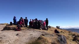 Locals praying on Volcano Santa Maria