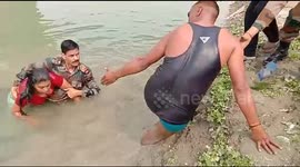 Brave soldier in India dives into river to rescue drowning woman