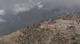People from Quetzaltenango (Xela) praying on the top of volcano Santa Maria