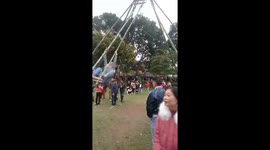 People participate in the bamboo swing challenge during a festival in Vietnam