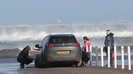 Car Stuck On Beach During Storm Denis