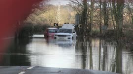 Cars stuck in flood water caused by storm Dennis in Derbyshire