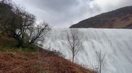 Dam overflowing after storm Dennis